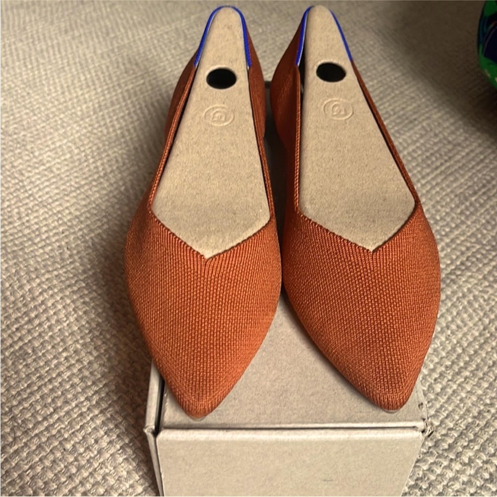 Rothy’s brandy color the pointe shoes.